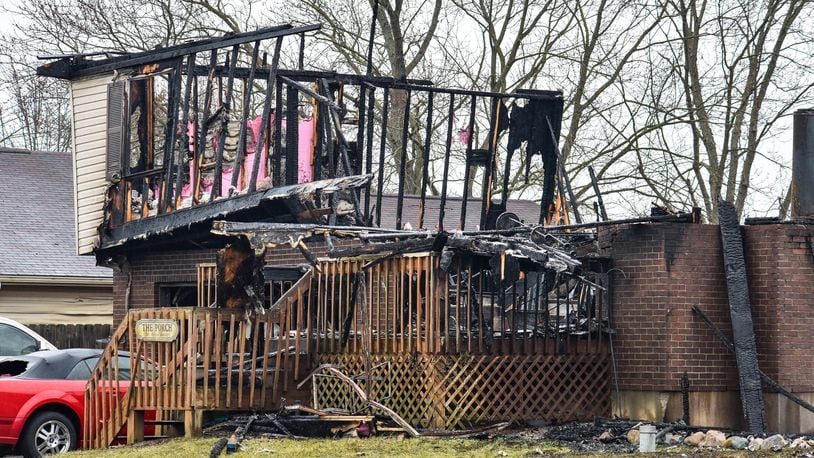 A huge fire destroyed two houses and damaged two more in the 6900 block of Torrington Drive in Franklin Township, according to Franklin Twp. Fire Chief Michael Hannigan. Hannigan said that they were first called to the scene at 11:07 p.m., and crews arrived to find heavy fire in the back of a house, which soon spread to the house next to it. NICK GRAHAM / STAFF
