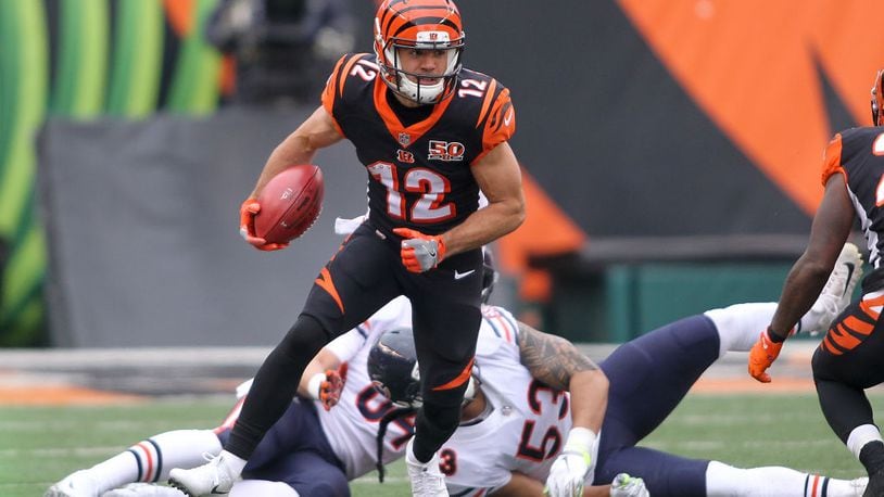 CINCINNATI, OH - DECEMBER 10: Alex Erickson #12 of the Cincinnati Bengals runs with the ball against the Chicago Bears during the first half at Paul Brown Stadium on December 10, 2017 in Cincinnati, Ohio. (Photo by John Grieshop/Getty Images)