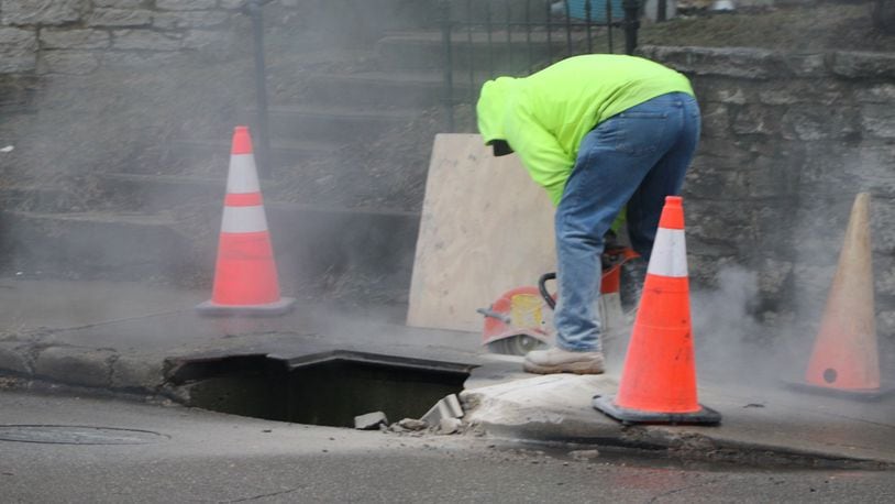 Crews work on a sewer in the South Park neighborhood. CORNELIUS FROLIK / STAFF