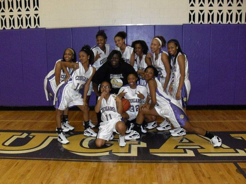 Head coach Tobette Pleasant-Brown with her Thurgood Marshall team. (CONTRIBUTED PHOTO
