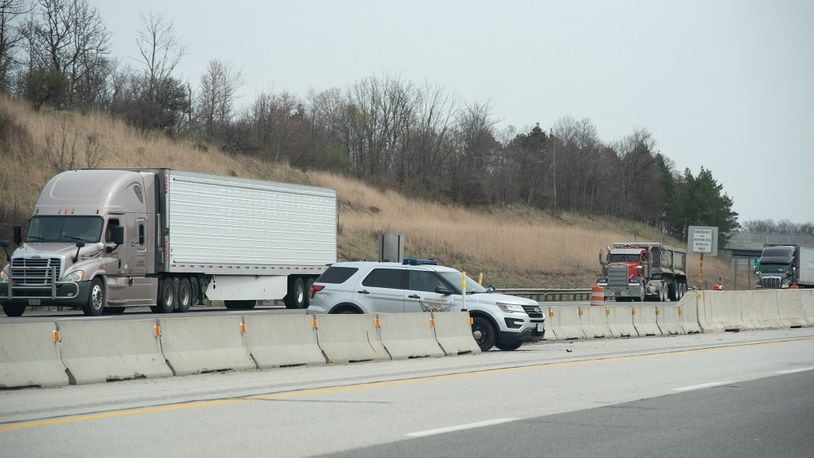 An Ohio Highway trooper hiding behind center barrier on the interstate monitoring motorists. MICHAEL T HARTMAN / SHUTTERSTOCK