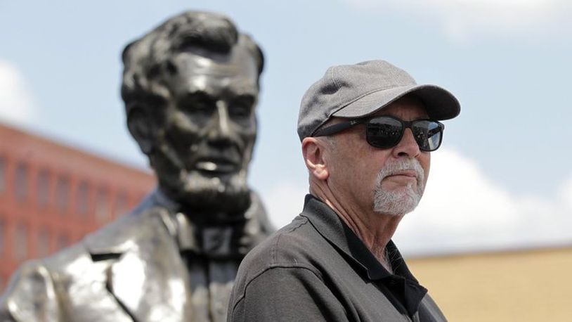A 1,700-pound bronze sculpture of Abraham Lincoln created by Urbana artist Mike Major (pictured) was delivered to Dayton in June 2020. The statue will be placed in a park at the Dayton VA Medical Center campus in the fall. LISA POWELL / STAFF