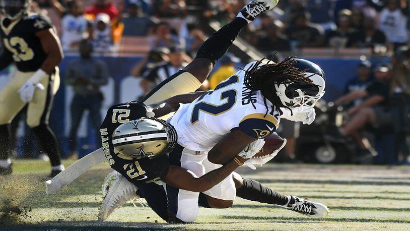 Los Angeles Rams receiver Sammy Watkins catches a touchdown pass as he is being tackled by New Orleans Saints cornerback De&apos;Vante Harris in the first quarter on Sunday, Nov. 26, 2017 in Los Angeles, Calif. (Wally Skalij/Los Angeles Times/TNS)