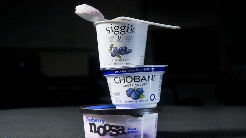 Three different yogurt products in studio in Sacramento on Thursday, Feb. 12, 2015. A recent study suggests yogurt could help lower risk of cardiovascular disease in adults who have high blood pressure. (Randall Benton/Sacramento Bee/TNS)