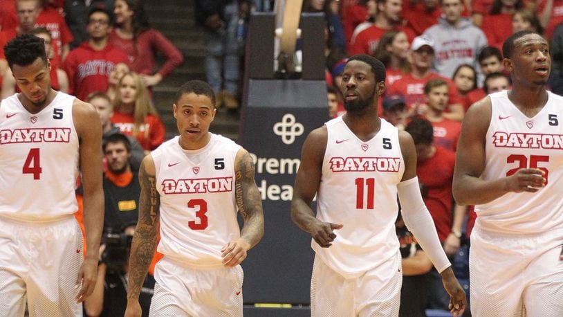 Dayton seniors Charles Cooke, Kyle Davis, Scoochie Smith and Kendall Pollard head up up the court after a defensive stop against Winthrop on Saturday, Dec. 3, 2016, at UD Arena in Dayton. David Jablonski/Staff