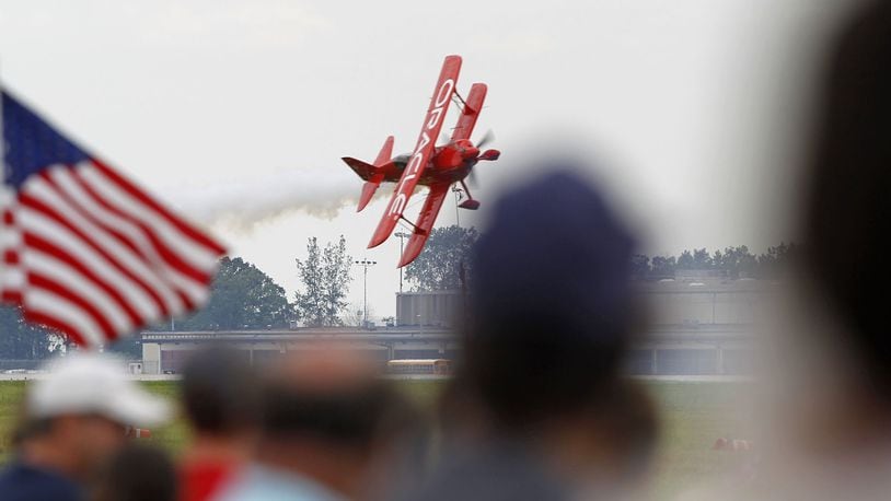 Sean D. Tucker flies his second to last solo performance in the Oracle Challenger III biplane in Dayton on Saturday at the Vectren Dayton Air Show. The plane is to be retired to the Smithsonian Air & Space Museum in December. TY GREENLEES / STAFF