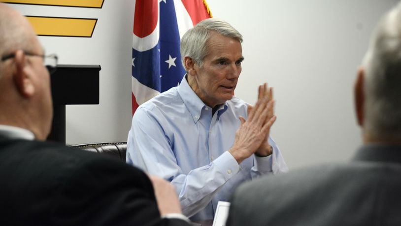 U.S. Sen. Rob Portman, R-Cincinnati, talks to Butler County leaders on Friday afternoon, Jan. 4, 2019, at the Butler County Sheriff’s Office about the opioid crisis facing the county and country. Before the discussion, Portman toured the jail and spoke with women benefiting from the 21st Century CURES Act, legislation he championed in Washington, D.C. MICHAEL D. PITMAN/STAFF