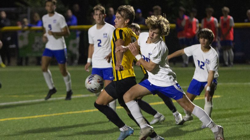 Centerville's Drew Gaydosh tries to keep the ball away from Springboro's Carson Crozier during Tuesday night's match in Centerville. The Elks' defense has allowed only five goals this season. CONTRIBUTED/Jeff Gilbert