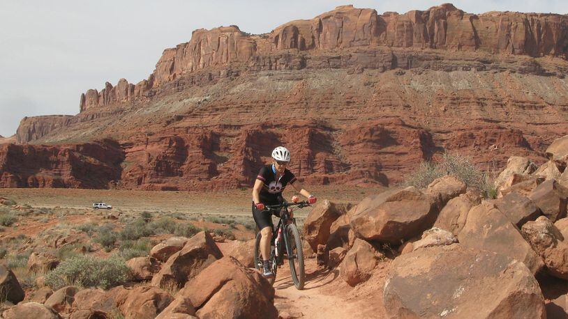 Mountain biker Lindsay Whiting of Rancho Santa Margarita navigates a trail outside Moab, Ut. (David Whiting/Orange County Register/TNS)