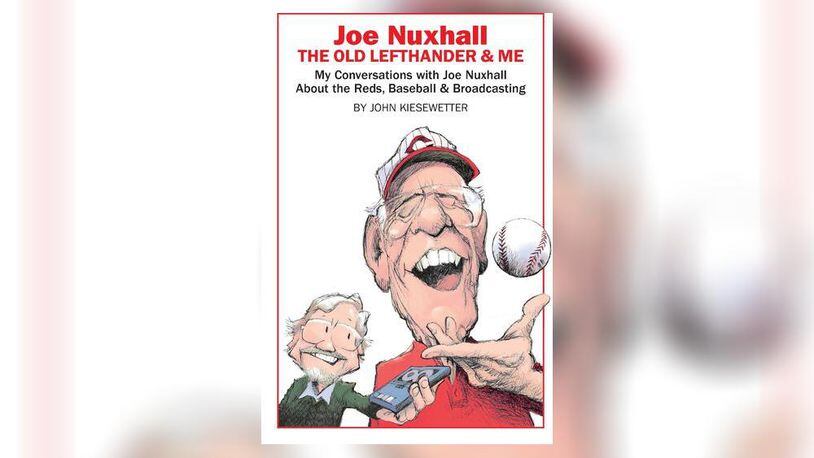The cover of John Kiesewetter's book, "Joe Nuxhall: The Old Lefthander & Me," was designed by syndicated comic strip cartoonist and Pulitzer Prize-winning editorial cartoonist Jim Borgman. PROVIDED