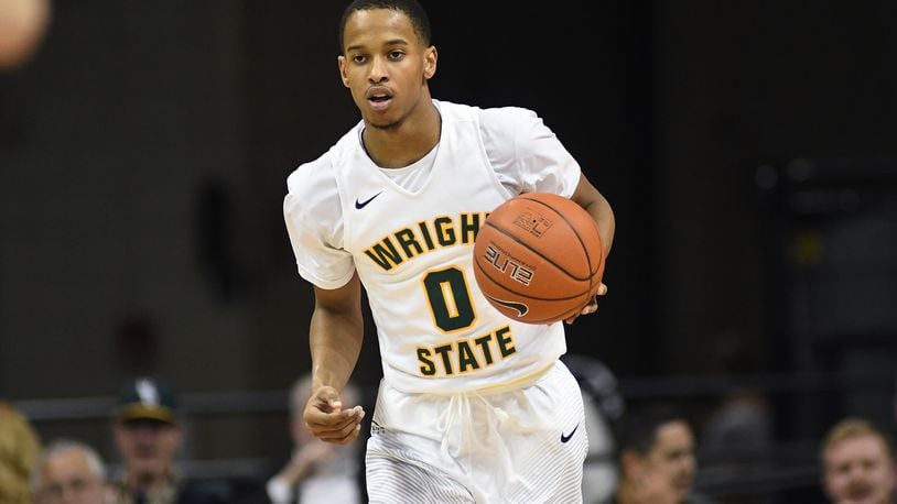 Wright State freshman Jaylon Hall brings the ball up the court against Wisconsin-Milwaukee on Saturday at the Nutter Center. KEITH COLE/CONTRIBUTED PHOTO