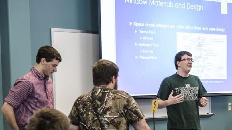 Students in an introductory materials science and engineering class at Wright State University analyzed what it would take for humans to safely travel to Mars, live on the red planet and return to Earth. (Wright State University photo)