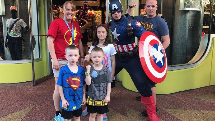 Gavin Musgrove, 4, of New Carlisle (front center) was excited when he and his family met Captain America at Disney World. CONTRIBUTED