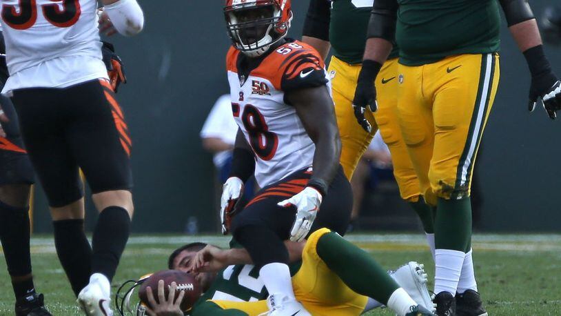 GREEN BAY, WI - SEPTEMBER 24: Carl Lawson #58 of the Cincinnati Bengals sacks Aaron Rodgers #12 of the Green Bay Packers during the third quarter of their game at Lambeau Field on September 24, 2017 in Green Bay, Wisconsin. (Photo by Dylan Buell/Getty Images)