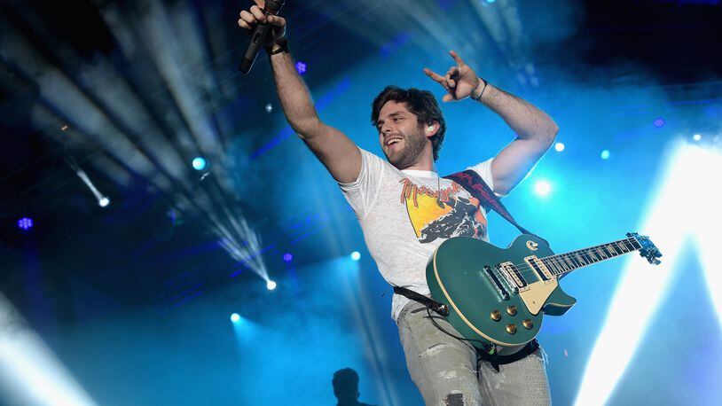 GLENDALE, AZ - JANUARY 28:  Singer Thomas Rhett performs onstage at the HGTV Lodge during Day 1 of the DirecTV Super Fan Festival at Pendergast Family Farm on January 28, 2015 in Glendale, Arizona.  (Photo by Rick Diamond/Getty Images for DirecTV)