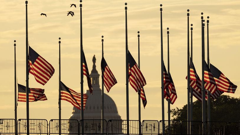 American flags are flown at half-staff in response to the San Jose mass shooting. Kevin Dietsch/Getty Images