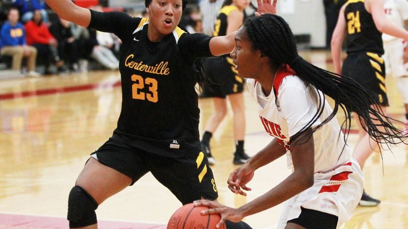 Bree Hall of Wayne (with ball) is checked by Cotie McMahon of Centerville. Wayne defeated visiting Centerville 56-37 in a GWOC girls high school basketball game on Wednesday, Dec. 11, 2019. MARC PENDLETON / STAFF