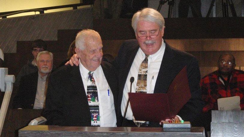 Former Kettering assistant police chief and city councilman Keith Thompson, who served the city for 55 years, has died. In this photo from 2011, Thompson, left, is shown being honored by Mayor Don Patterson. CONTRIBUTED