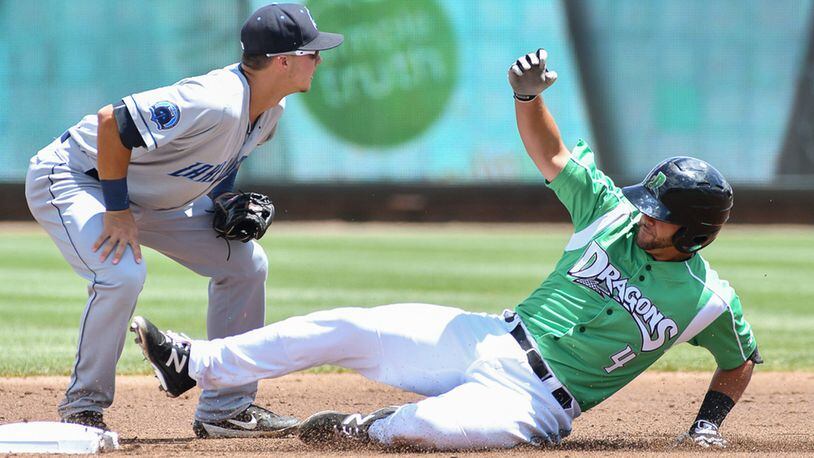 Dayton’s John Sansone (right) slides into second base during the second inning of a game against Lake County on Sunday at Fifth Third Field. Contributed Photo by Bryant Billing