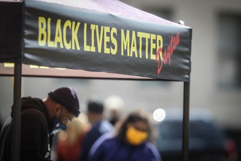 On Wednesday, community members gathered for a Black Lives Matter Dayton rally near the old NAACP building in the 1500 block of West Third Street.  Organizers said the rally was to be held in concert with other groups across the country to protest the killing of black men and women by police.  JIM NOELKER/STAFF
