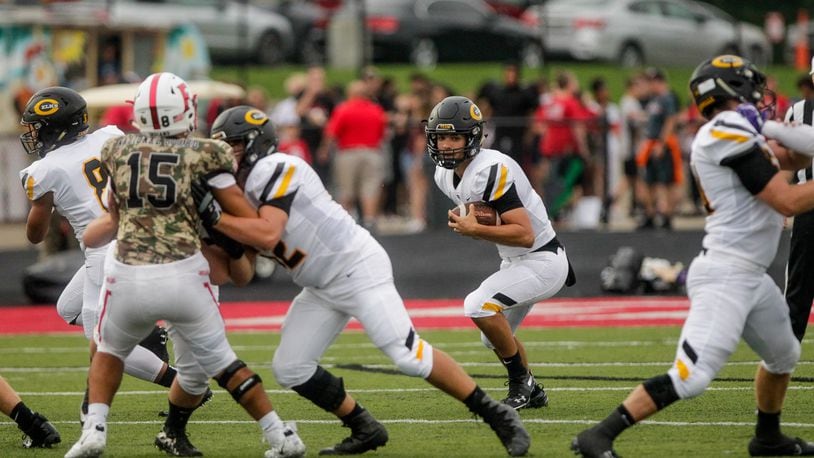 Centerville quarterback Chase Harrison carries the ball during their season opener football game against Fairfield Friday, August 30 in Fairfield. Farifield won 33-7. NICK GRAHAM/STAFF