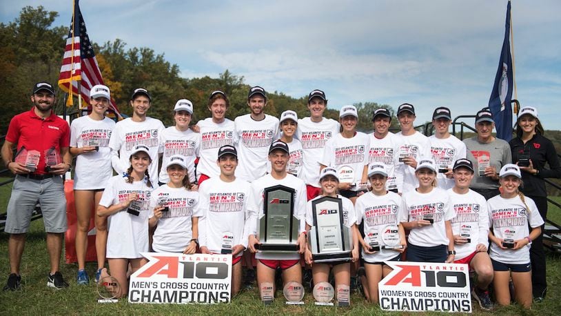 Dayton's men's and women's cross country teams pose for a photo after winning Atlantic 10 championships on Saturday, Oct. 28, 2017, in Fairfax, Va.