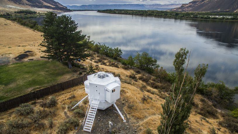 Kurt Hughes’ lunar lander sits on an acre of fragile wetlands along the Columbia River near Beverly in Central Washington. “When we excavated for the septic system, I said to leave the rocks and make sure it gets back to the original,” Hughes says. “The idea is low impact on the land, especially an archaeologically historic area. I don’t want to be digging. Most people my age spend $15,000 on two Kawasaki Ninjas — me, I buy a septic tank.” (Steve Ringman/Seattle Times/TNS)