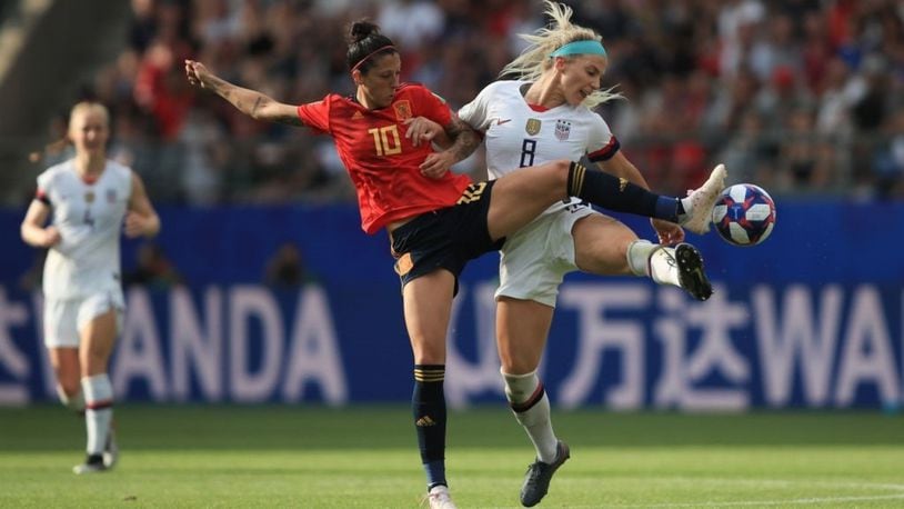 REIMS, FRANCE - Jennifer Hermoso of Spain and Julie Ertz April of  the U.S. team go after a ball during the 2019 FIFA Women's World Cup France Round Of 16 match.