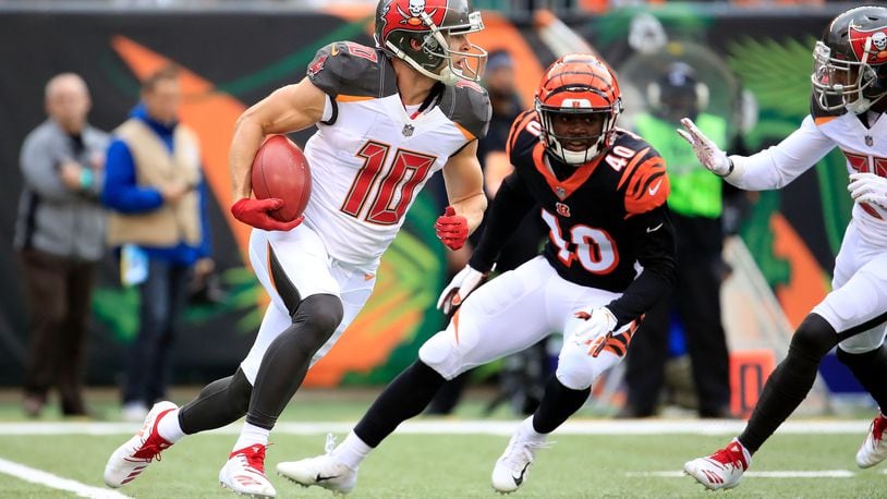 CINCINNATI, OH - OCTOBER 28: Adam Humphries #10 of the Tampa Bay Buccaneers runs the ball past Brandon Wilson #40 of the Cincinnati Bengals during the first quarter at Paul Brown Stadium on October 28, 2018 in Cincinnati, Ohio. (Photo by Andy Lyons/Getty Images)