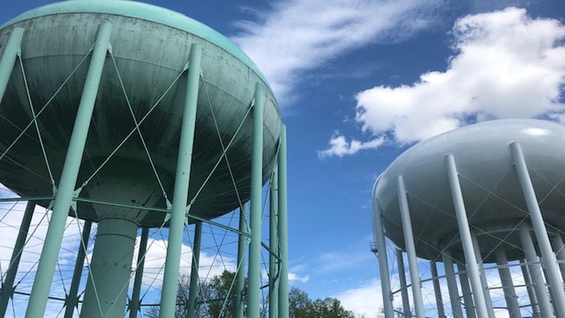 A Montgomery County water tank serving Centerville and Kettering will soon get a $1.3 million refurbishing, including its first repainting in 28 years. A similar tank next to it was repainted last year. NICK BLIZZARD/STAFF