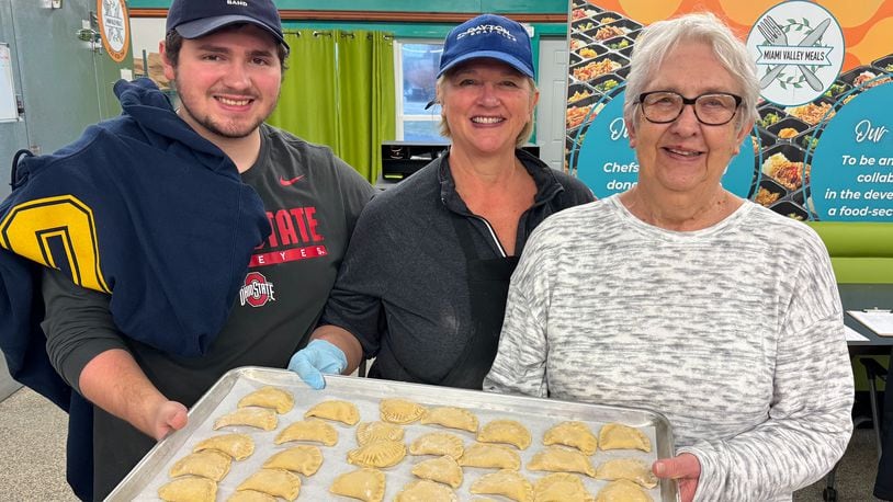 Miami Valley Meals (MVM) is kicking off a new fundraiser called “Pierogies with a Purpose." Pictured is MVM board member Ricia Ballas (middle) with her son and mother (CONTRIBUTED PHOTO).