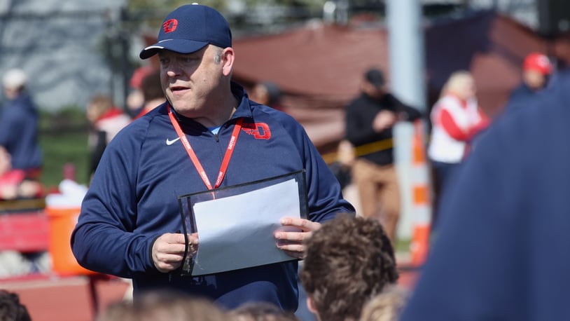Dayton's Trevor Andrews talks to the team after the annual spring football game on Sunday, April 2, 2023, at the Jerry Von Mohr Practice Facility in Dayton. David Jablonski/Staff