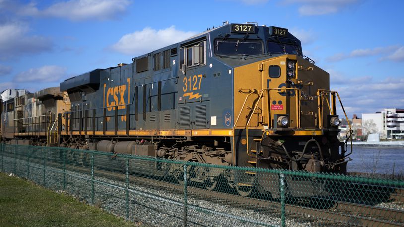 FILE - A CSX freight train sits on a siding in downtown Pittsburgh, Nov. 19, 2022. CSX reports their earnings on Wednesday, April 17, 2024. (AP Photo/Gene J. Puskar, File)