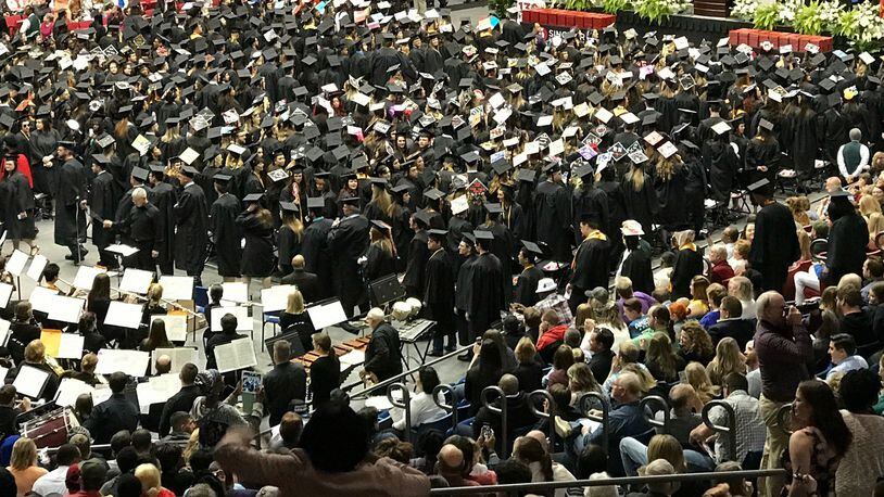 Sinclair Community College held its graduation ceremony on Sunday at UD Arena. Bill and Melinda Gates Foundation CEO Sue Desmond-Hellmann served as the commencement speaker for the event that awarded a record 4,600 degrees and certificates. STAFF