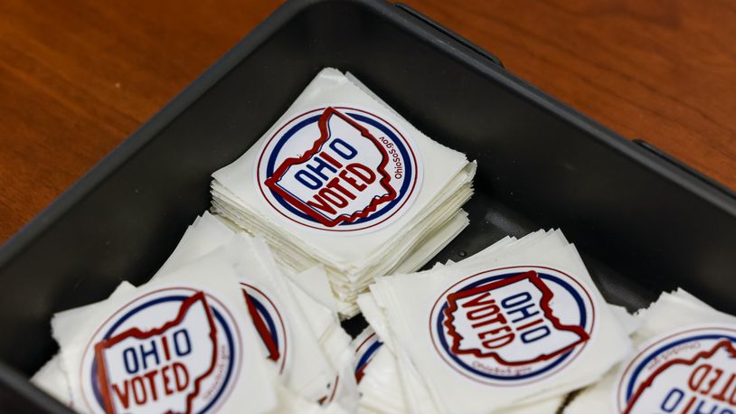 Stickers are ready  to be handed out to early voters Monday, Nov. 1, 2021 at the Butler County Board of Elections in Hamilton. NICK GRAHAM/STAFF
