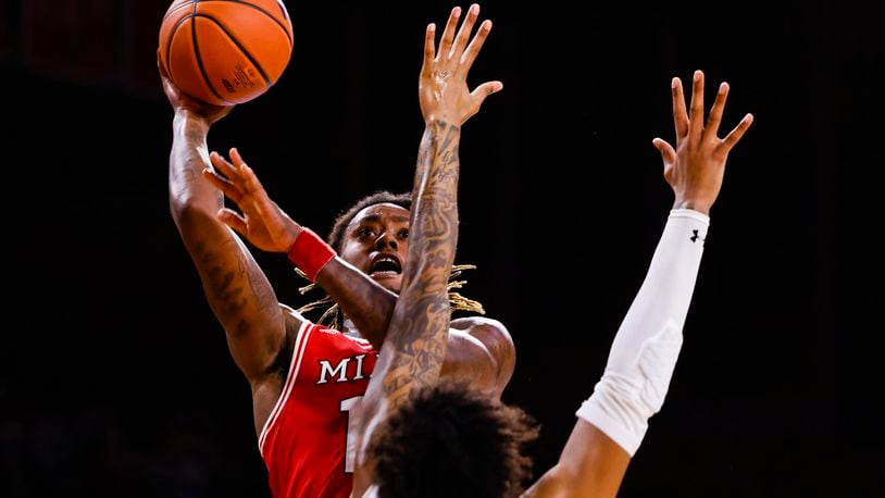 Miami University's Dalonte Brown puts up a shot during their basketball game against University of Cincinnati Wednesday, Dec. 1, 2021 at Millett Hall on Miami University campus in Oxford. University of Cincinnati won 59-58. NICK GRAHAM / STAFF