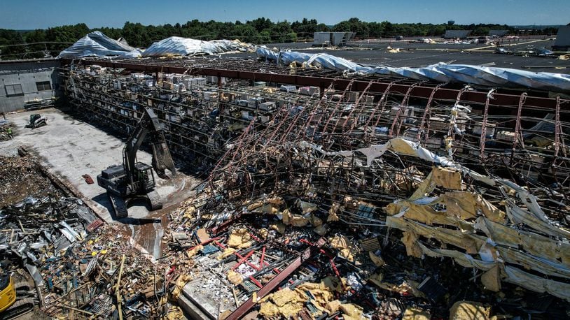 The Meijer Distribution Center in Tipp City was on its way to recovery in this June 27 picture, after a tornado ripped up the northwest corner of this building on June 8, 2022. Workers were removing pieces of the collapsed metal structure. JIM NOELKER/STAFF
