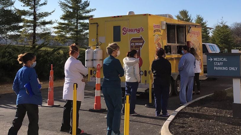 Young's Dairy has been giving away ice cream and cheese curds to frontline medical workers. On Wednesday, they were at Soin Medical Center in Beavercreek. STAFF/BONNIE MEIBERS