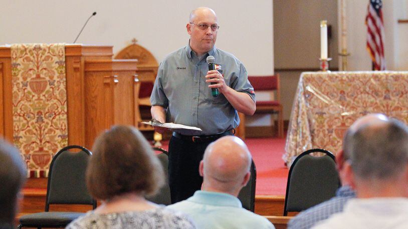 Jeff Jordan, Montgomery County’s emergency management director, talks to about 80 people who gathered at St. Margaret’s Episcopal Church in Trotwood on June 19, 2019, to plan long-term tornado recovery efforts. CHRIS STEWART / STAFF