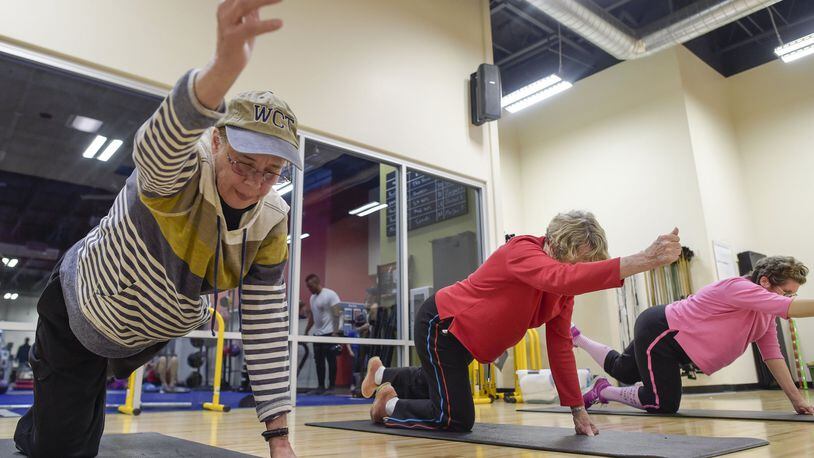 Cancer survivors from left, Dana Hadley, Beverly Tobey and Dina Moerschbacher stay in shape during recovery with a fitness program run by cancer exercise specialist Jeff Rheault and instructor Jessica Tax with the nonprofit Triumph Foundation at California Family Fitness on Wednesday, February 15, 2017 in Sacramento, Calif. (Manny Crisostomo/The Sacramento Bee/TNS)