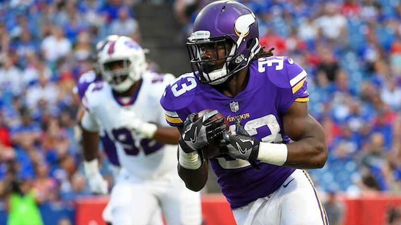 Minnesota Vikings running back Dalvin Cook (33) rushes during the first half of a preseason NFL football game against the Buffalo Bills Thursday, Aug. 10, 2017, in Orchard Park, N.Y. (AP Photo/Rich Barnes)
