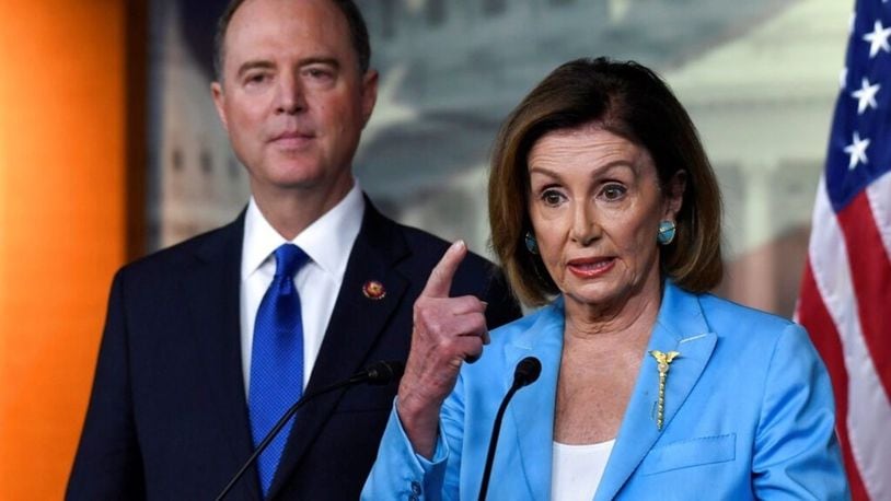 House Speaker Nancy Pelosi of Calif., right, joined by House Intelligence Committee Chairman Rep. Adam Schiff, D-Calif., left, speaks during a news conference on Capitol Hill in Washington, Wednesday, Oct. 2, 2019.