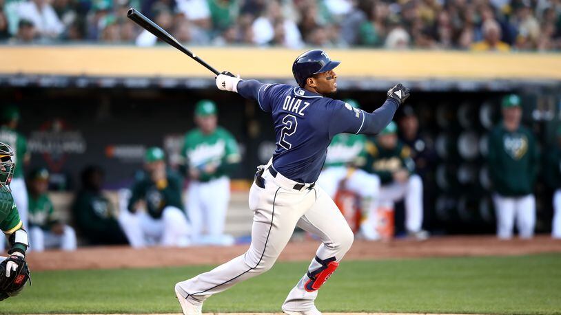 OAKLAND, CALIFORNIA - OCTOBER 02:  Yandy Diaz #2 of the Tampa Bay Rays hits a solo home run off Sean Manaea #55 of the Oakland Athletics	in the third inning of the American League Wild Card Game at RingCentral Coliseum on October 02, 2019 in Oakland, California. (Photo by Ezra Shaw/Getty Images)