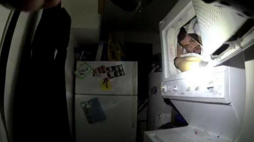 Spokane police found a man hiding from officers inside a dryer. (Photo: Spokane Police)