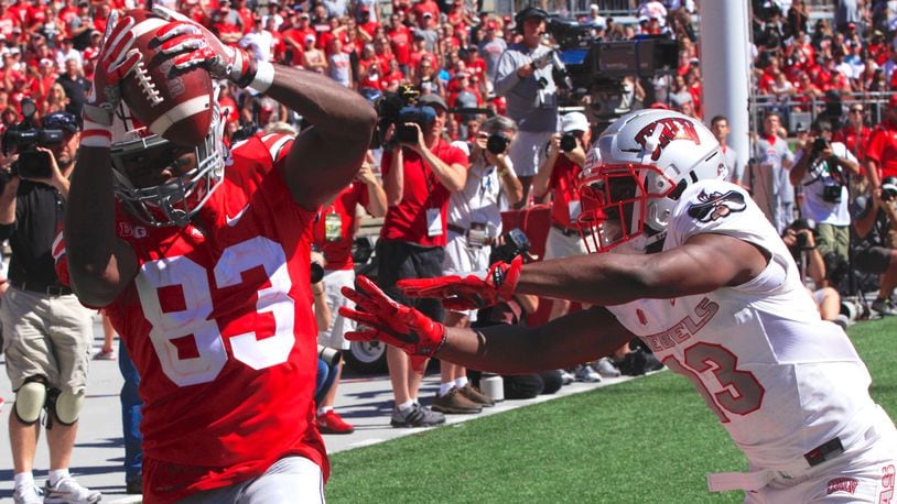 Ohio State's Terry McLaurin catches a touchdown against UNLV's Tim Hough on Saturday, Sept. 23, 2017, at Ohio Stadium in Columbus. David Jablonski/Staff