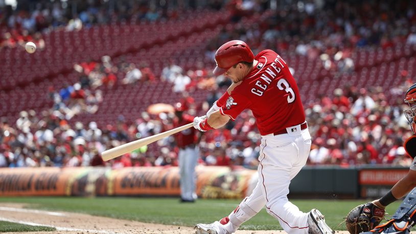 CINCINNATI, OH - JUNE 20: Scooter Gennett #3 of the Cincinnati Reds hits a two-run home run to tie the game in the sixth inning against the Detroit Tigers at Great American Ball Park on June 20, 2018 in Cincinnati, Ohio. The Reds won 5-3. (Photo by Joe Robbins/Getty Images)