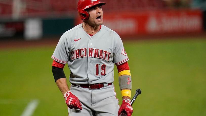 Cincinnati Reds' Joey Votto yells after being ejected by home plate umpire D.J. Reyburn during the ninth inning of a baseball game against the St. Louis Cardinals Saturday, Sept. 12, 2020, in St. Louis. (AP Photo/Jeff Roberson)