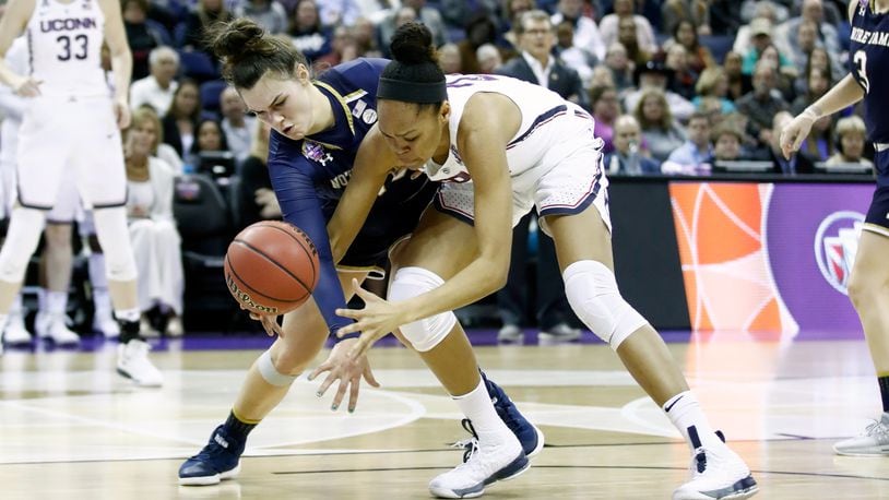 Kathryn Westbeld #33 of the Notre Dame Fighting Irish battles for the ball with Azura Stevens #23 of the Connecticut Huskies during the second half in the semifinals of the 2018 NCAA Women’s Final Four at Nationwide Arena on March 30, 2018 in Columbus, Ohio. (Photo by Andy Lyons/Getty Images)