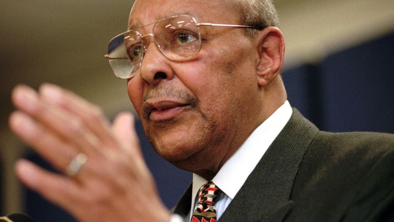 FILE - In this Saturday, Jan. 17, 1998, file photo, Rep. Louis Stokes, D-Ohio, announces, at the Carl B. Stokes Social Services Mall in Cleveland, that he will retire from Congress at the end of the year. Stokes, a 15-term Ohio congressman who took on tough assignments looking into assassinations and scandals, died late Tuesday, Aug. 18, 2015. Stokes was 90. (AP Photo/Tony Dejak, File)
