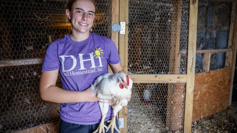 Ava Simon is one of the 300 participants in the upcoming Montgomery County Fair who has had a positive experience. Simon, a Brookville resident, started in 4-H about 8 years ago and has competed at the Montgomery County Fair since then. JIM NOELKER / STAFF